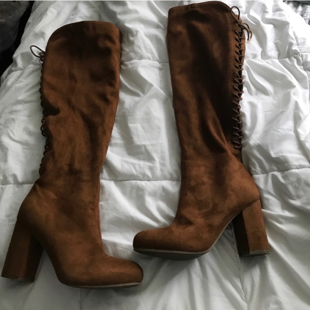 Brown knee high lace up boots